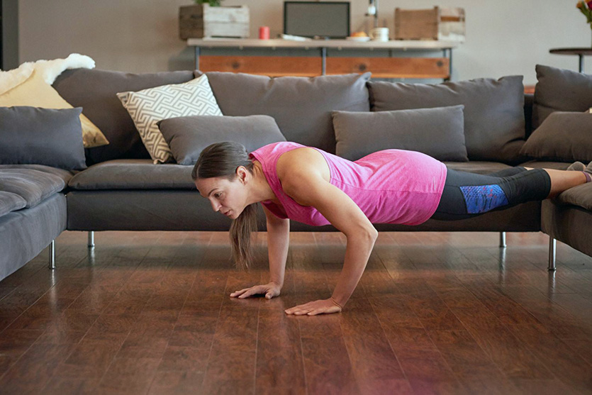 Woman Doing Push-up Inside House