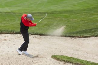 How to Hit a Downhill Bunker Shot