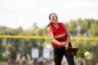 softball pitcher throwing a screwball