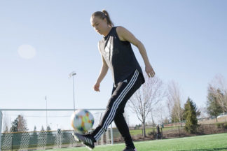 Emily Sonnett Juggling Soccer Ball