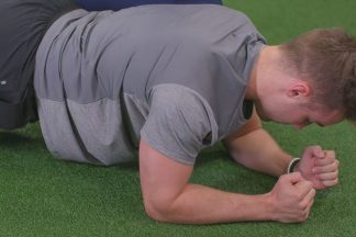 Male Athlete Demonstrating A Plank