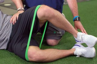 Athlete Demonstrating Glute Clam Exercise